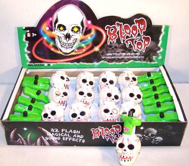 Skull Spinning Laughing LED Toy