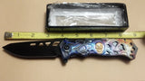 Skull 8 Inch Blue Yellow Space Handle Spring Assisted Folding Pocket Knife